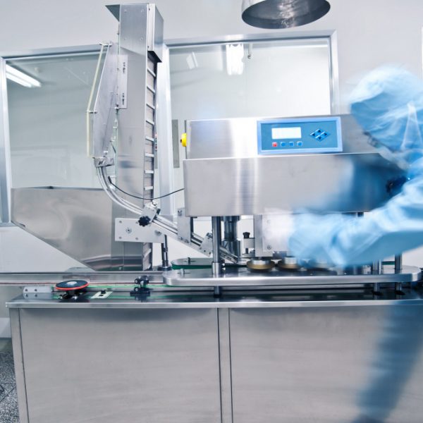Technicians working in the pharmaceutical production line Machine overhaul and modification